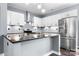 Spacious kitchen featuring stainless steel appliances and bright white cabinets at 105 4Th Se St, Catawba, NC 28609