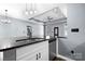 Kitchen island with sink and dishwasher and featuring granite countertops and recessed lighting at 105 4Th Se St, Catawba, NC 28609