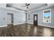 An open living space with neutral walls, hardwood floors, and a modern ceiling fan at 105 4Th Se St, Catawba, NC 28609