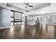 Open-concept living room and kitchen with hardwood floors and modern lighting fixtures at 105 4Th Se St, Catawba, NC 28609