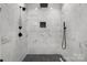 Modern walk-in shower with rainfall shower head and floor-to-ceiling marble tiles at 105 4Th Se St, Catawba, NC 28609