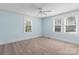 Well-lit bedroom with natural light and carpet, ready to be your place to rest and relax at 10633 Hwy 52 Hwy, Rockwell, NC 28138