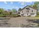 Charming home with gray siding, manicured landscaping, and a gravel driveway at 10633 Hwy 52 Hwy, Rockwell, NC 28138