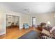 Open-concept living space with hardwood floors, adjacent dining room, and ample natural light at 10633 Hwy 52 Hwy, Rockwell, NC 28138