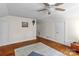 Inviting living room showcasing hardwood floors and neutral paint, ready for your personal touch at 10633 Hwy 52 Hwy, Rockwell, NC 28138
