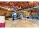 Spacious basement features a home gym area and a pool table for recreation at 11416 Leadenhall Ln # 22, Charlotte, NC 28262