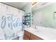 Bathroom showcasing a toilet, vanity with sink, and a shower with a unique cactus-themed curtain at 11416 Leadenhall Ln # 22, Charlotte, NC 28262