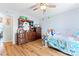 Cozy bedroom featuring classic wood furniture, a comfortable bed, and ample natural light for a relaxed setting at 11416 Leadenhall Ln # 22, Charlotte, NC 28262