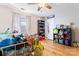 Bright bedroom with a playful theme featuring a bed, shelves, and soft natural light through the window at 11416 Leadenhall Ln # 22, Charlotte, NC 28262