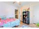 Bright bedroom with a colorful theme featuring a bed, playful decor, and ample storage at 11416 Leadenhall Ln # 22, Charlotte, NC 28262