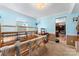 Bright bedroom with a weaving loom, a window with natural light, and neutral carpet flooring at 11416 Leadenhall Ln # 22, Charlotte, NC 28262