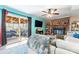 This bright living room features a fireplace, wood floors and an outdoor view at 11416 Leadenhall Ln # 22, Charlotte, NC 28262
