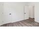 Bedroom with wood floors and multiple entryways at 1156 9Th St, Lancaster, SC 29720