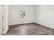 Bright bedroom features a window and wood-look laminate flooring at 1156 9Th St, Lancaster, SC 29720
