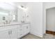 Bathroom featuring double vanity with grey cabinets and a large mirror and tile flooring at 1157 Bunch Dr, Statesville, NC 28677