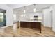 Open kitchen design with center island, stainless steel appliances, and open to living area at 1157 Bunch Dr, Statesville, NC 28677