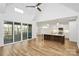 Spacious open concept living area with hardwood floors, kitchen with island and vaulted ceilings at 1157 Bunch Dr, Statesville, NC 28677
