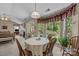 A sunny dining area connects the kitchen and living room, with backyard views at 1286 Saint Katherines Way, Rock Hill, SC 29732