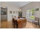 Bright dining room featuring hardwood floors and a classic chandelier at 1286 Saint Katherines Way, Rock Hill, SC 29732