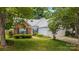 Attractive home with brick facade, white siding, well-maintained landscaping, and a two-car garage at 1286 Saint Katherines Way, Rock Hill, SC 29732