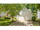 Street view of house with brick and siding, a well-manicured lawn and a two-car garage at 1286 Saint Katherines Way, Rock Hill, SC 29732