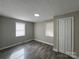 Comfortable bedroom featuring hardwood floors and a closet at 1408 Linwood Rd, Gastonia, NC 28052