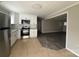 Well-lit kitchen with stainless steel appliances and subway tile backsplash at 1408 Linwood Rd, Gastonia, NC 28052