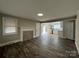 Spacious living room boasting hardwood floors and a cozy fireplace at 1408 Linwood Rd, Gastonia, NC 28052