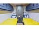 Cozy bedroom with twin beds, custom storage, and modern decor at 162 Dogwood Cir, New London, NC 28127