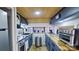 Compact kitchen features stainless steel appliances, wood countertops, and natural light at 162 Dogwood Cir, New London, NC 28127
