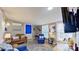 Comfortable living room featuring a sofa and a leather couch, a TV and well lit by natural light at 162 Dogwood Cir, New London, NC 28127