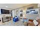 Living area showcasing open layout, modern furnishings, and seamless connection to the kitchen at 162 Dogwood Cir, New London, NC 28127
