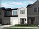 Charming new construction townhome featuring a two-car garage and beautifully landscaped front yard at 1734 Braemar Village Dr, Monroe, NC 28110
