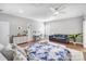 A large bedroom features a queen bed, hardwood floors, lots of space, and natural lighting at 215 Wesley Manor Dr, Matthews, NC 28104