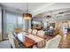 Elegant dining area flowing into the living space, showcasing an open floor plan at 215 Wesley Manor Dr, Matthews, NC 28104