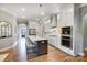 Bright kitchen showcasing a spacious island, stainless appliances, and ample cabinet space at 215 Wesley Manor Dr, Matthews, NC 28104