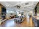 Spacious living room with fireplace, built-in bar, and an open layout showcasing the home's design at 215 Wesley Manor Dr, Matthews, NC 28104