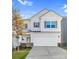 Charming two-story home with a large attached two car garage and manicured lawn at 2202 Catawba Trace Dr, Catawba, NC 28609