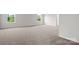 Bright bedroom featuring neutral carpet, large windows, and ample natural light at 2223 Catawba Trace Dr, Catawba, NC 28609