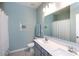 Serene bathroom featuring soft blue walls, a stylish vanity, and a well-lit mirror at 2296 Idol Rock Dr, Indian Land, SC 29707