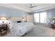 Serene bedroom with plush carpet, tray ceilings, and large windows for ample natural light at 2296 Idol Rock Dr, Indian Land, SC 29707