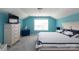 Bright bedroom with aqua walls, white trim, and a nautical theme with a large bed and gray carpet at 2296 Idol Rock Dr, Indian Land, SC 29707