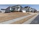 Charming home featuring stone accents, a two-car garage, and a well-manicured lawn in a desirable neighborhood at 2296 Idol Rock Dr, Indian Land, SC 29707