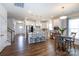 Open concept kitchen features a large island, stainless steel appliances, and bright cabinets at 2296 Idol Rock Dr, Indian Land, SC 29707