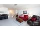 Comfortable living room with a piano, cozy seating arrangement, and lots of natural light at 2296 Idol Rock Dr, Indian Land, SC 29707