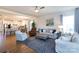 Spacious living room with large windows, comfortable seating, and open access to the kitchen at 2296 Idol Rock Dr, Indian Land, SC 29707