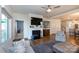 Inviting living room with a fireplace, modern decor, and an open layout, creating a cozy atmosphere at 2296 Idol Rock Dr, Indian Land, SC 29707
