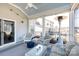 Inviting screened-in porch with comfortable seating and a cozy outdoor ambiance at 2296 Idol Rock Dr, Indian Land, SC 29707