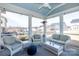 Covered patio with comfortable seating, a ceiling fan, and views of the backyard at 2296 Idol Rock Dr, Indian Land, SC 29707