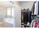 Walk-in closet connecting to the bathroom, offering an abundance of organized storage at 2296 Idol Rock Dr, Indian Land, SC 29707